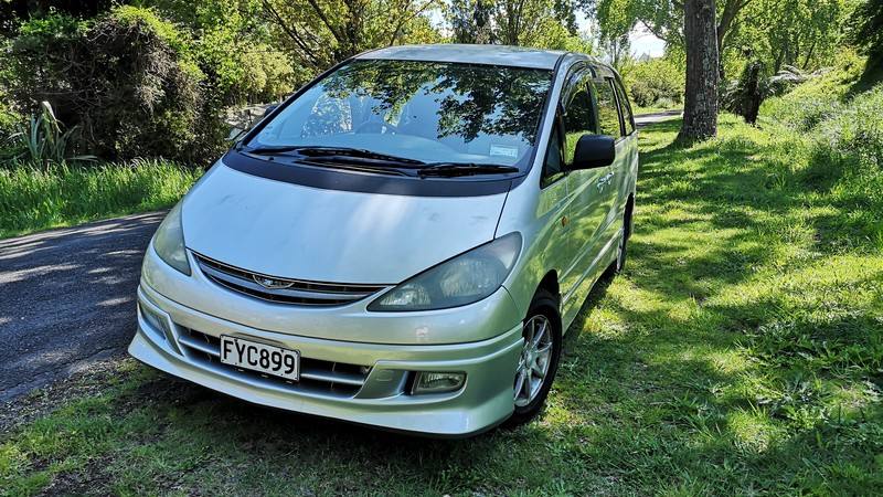 Front of the silver Toyota Estima campervan with registration FYC899
