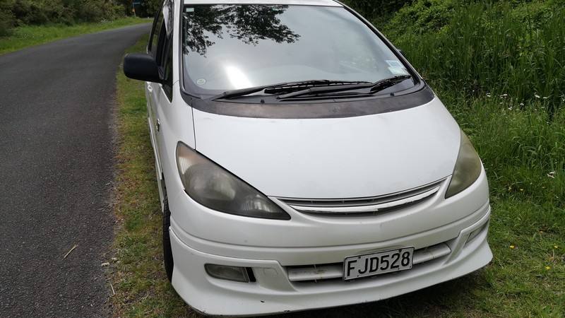 Front three-quarter view of the FJD528 Toyota Estima campervan from the driver's side