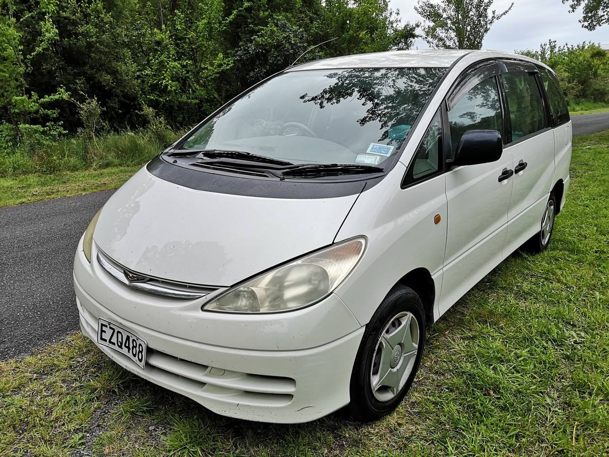White 2002 Toyota Estima self-contained campervan for sale, registration EZQ488, front three-quarter view