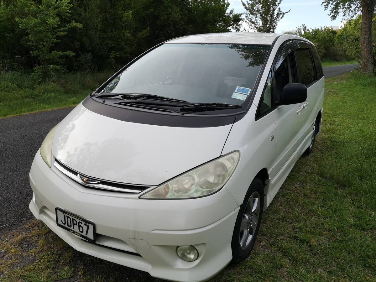 Front of the white Toyota Estima campervan with registration JDP67