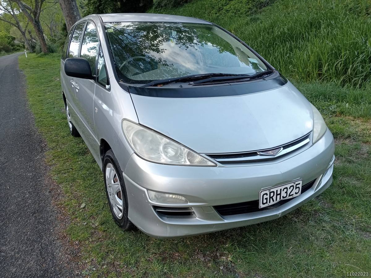 Silver 2004 Toyota Estima self-contained campervan for sale, registration GRH325, front three-quarter view