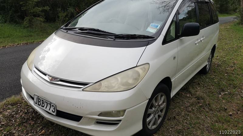 White 2005 Toyota Estima self-contained campervan for sale, registration JBB773, front three-quarter view