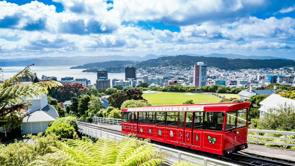 Red Wellington cable car above the city