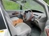Driver's seat, wood-rim steering wheel and plywood console box of the FQK81 Toyota Estima campervan