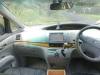 Dashboard, stereo and steering wheel of the KHP570 Toyota Estima campervan