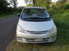 Front of the Toyota Estima campervan with registration FPS382, parked on a country road