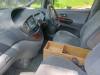 Dashboard, wood-rim steering wheel and plywood console box of the FDK492 Toyota Estima campervan