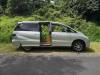 Side view of the silver 2005 Toyota Estima campervan KBZ76 with the side door open