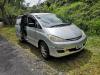 Silver 2005 Toyota Estima self-contained campervan for sale, registration KBZ76, side door open