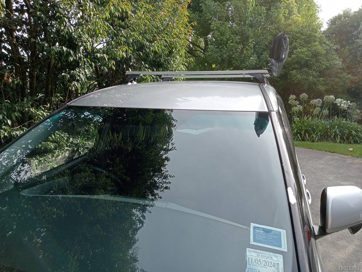 Roof rack bars fitted across the roof of the JTQ214 Toyota Estima campervan