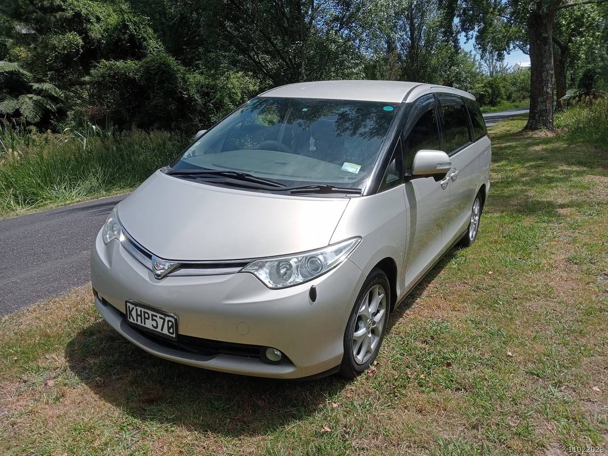 Gold 2006 Toyota Estima self-contained campervan for sale, registration KHP570, front three-quarter view