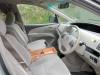 Front seats and dashboard of the JNQ545 Toyota Estima, plywood console box between the seats