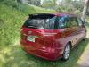 Rear three-quarter view of the JAK653 Toyota Estima campervan from the passenger side