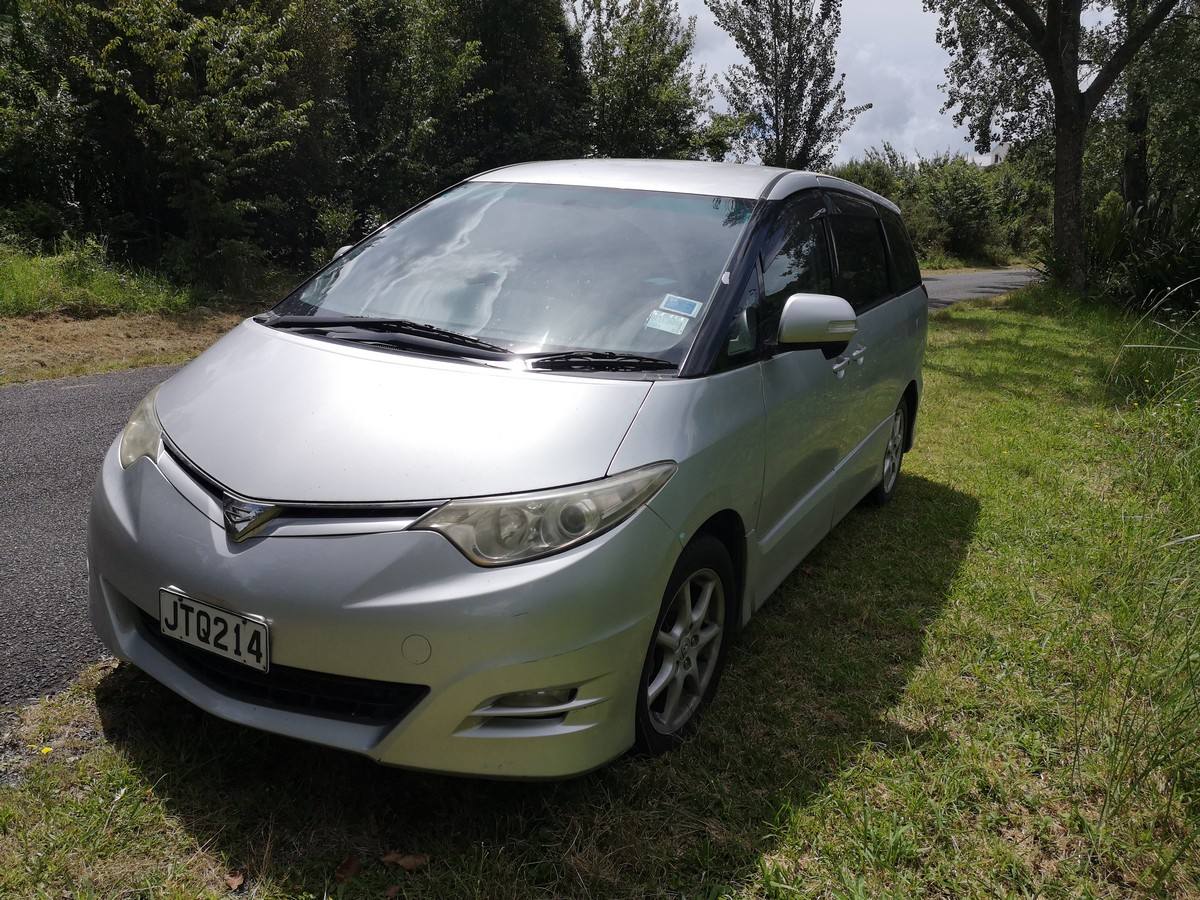 Front three-quarter view of the JTQ214 Toyota Estima campervan from the driver's side
