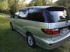 Rear three-quarter view of the silver Toyota Estima campervan FPS382
