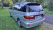 Rear three-quarter view of the silver 2002 Toyota Estima campervan ERT416