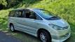 Silver 2002 Toyota Estima self-contained campervan for sale, front three-quarter view from the driver's side