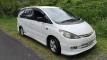 White 2001 Toyota Estima self-contained campervan for sale, registration FJD528, front three-quarter view