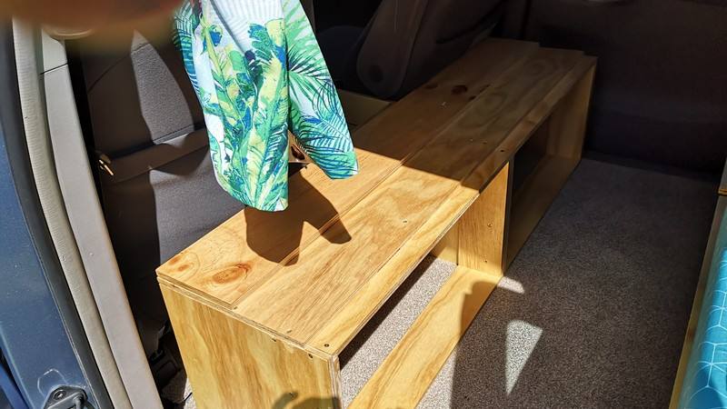 Plywood storage box and bench built into the back of the DJR846 campervan