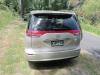 Back of the gold Toyota Estima campervan with registration KHP570