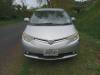 Front of the silver Toyota Estima campervan with registration JNQ545