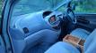 Dashboard and front seats of the ERT416 Toyota Estima, plywood console box between the seats