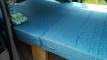 Close view of the made-up double bed in the blue DJR846 Toyota Estima campervan
