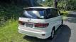 Rear three-quarter view of the white 2005 Toyota Estima campervan GQG541