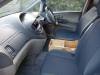 Dashboard and front seats of the GRH325 Toyota Estima, plywood console box between the seats