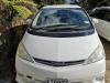 Front of the white Toyota Estima campervan with registration KZR927