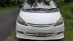 Front of the white Toyota Estima campervan with registration FJD528