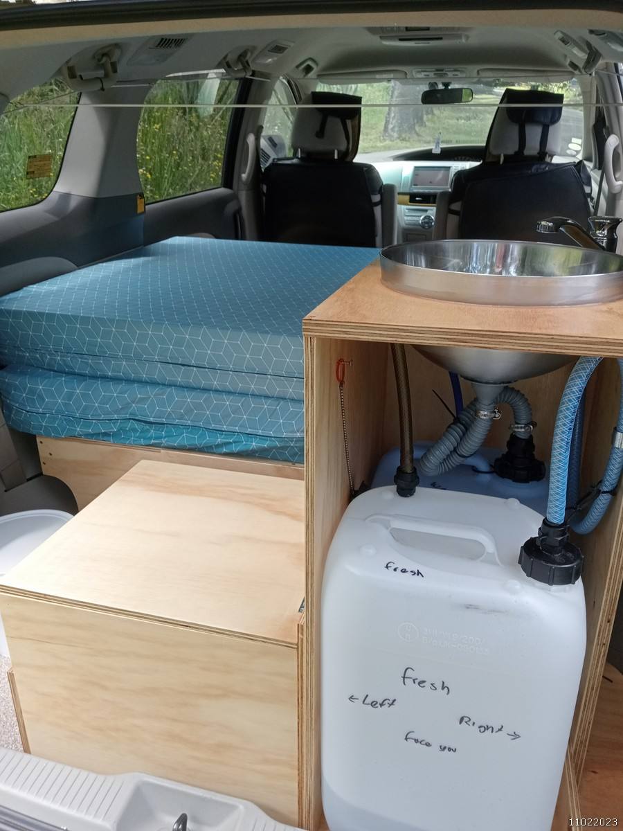 Kitchen unit in the KHP570 campervan with stainless sink and the fresh water container plumbed underneath