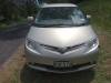 Front of the gold Toyota Estima campervan with registration KHP570