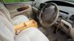 Front seats, steering wheel and plywood console box of the JBB773 Toyota Estima campervan