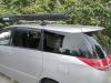 Roof rack on the JTQ214 Toyota Estima campervan with a rolled awning mounted along the side