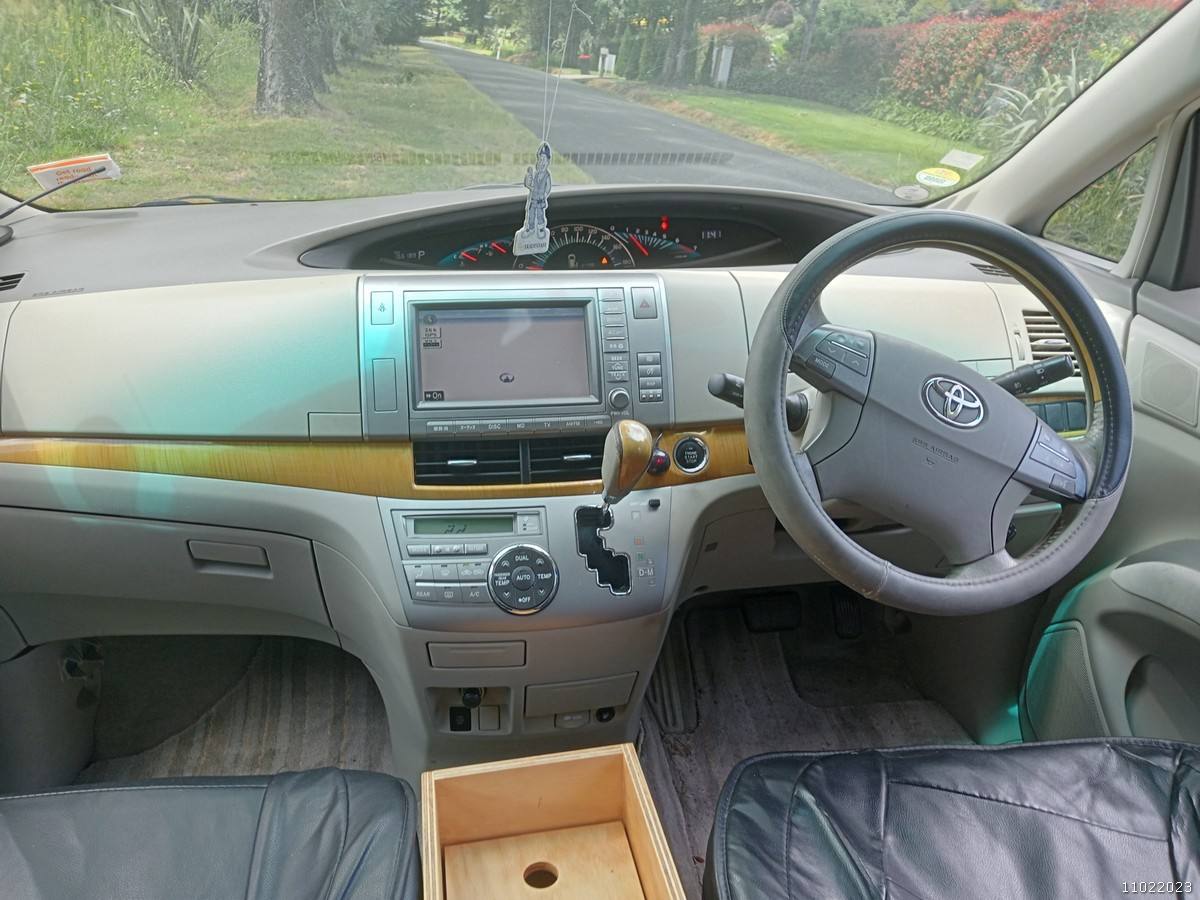 Dashboard and centre console of the KHP570 Toyota Estima campervan seen from the back seats